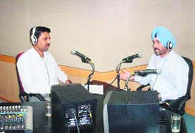 Group captain GS Bedi interacts with listeners via community radio on the CDLU campus in Sirsa