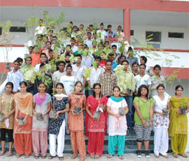 Students of St Soldier College of Education hold saplings on Greenery Day in Jalandhar.