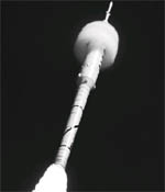 The Ares 1-X test rocket lifts off on a six-minute suborbital flight as a cone of moisture forms from air compression at the Kennedy Space Center in Cape Canaveral, Florida, October 28, 2009. The test rocket is being evaluated as a vehicle to replace the space shuttle for U.S. manned spaceflight.
