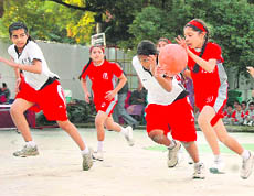  A match in the Tek Chand Memorial Basketball Tournament at Doon Girls School in Dehradun on Friday. 