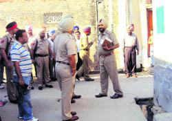 Cops inspect the site where Sonu was shot dead in Amloh on Thursday.