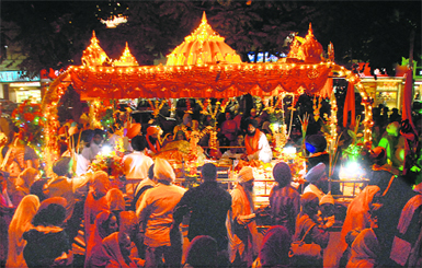 Devotees take part in nagar kirtan on the eve of Guru Nanaks birth anniversary in Chandigarh 