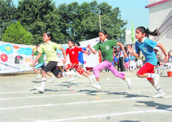 Students participate in a race at Doon Valley School in Dehradun on Saturday. 