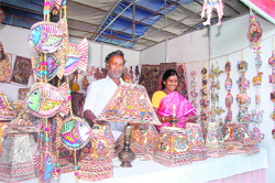 Hanumantha Rao and his wife at their stall at the Saras Mela in Dehradun 