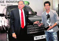 Ratan Tata, chairman, Tata Sons and Tata motors, presents keys of a new Range Rover 2010 to actor Shahid Kapoor in Mumbai on Monday