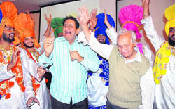 Actor-comedian Mehar Mittal along with Nek Chand dance to the beats of Punjabi songs at the Senior Citizens Day celebrations in Chandigarh.