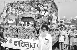 Devotees take out a nagar kirtan on the eve of Gurpurb in Sirhind on Sunday.