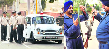 Security personnel outside the Taj Hotel.