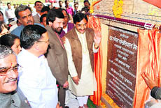 Uttarakhand Chief Minister Ramesh Pokhriyal Nishank lays the foundation stone of extension work of the Naini-Saini airstrip in Pitthoragarh on Sunday. 