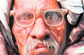 HARYANA DAY: A common man waiting for a bus near Panchkula