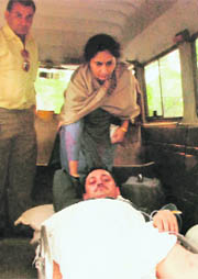Congress leader Sanjiv Bhargav, alias Rocky, being rushed to hospital after he was shot at.