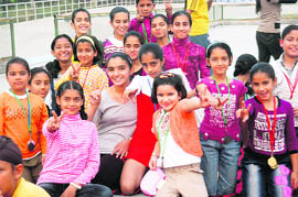 Students of GNPS, Sacred Heart Convent School and Kalgidhar Academy flash V-sign after winning prizes in District Roller Skating Championship in Ludhiana.
