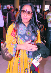 Tribune lensmen Vinay Malik catches singer-actor Ila Arun at the Chandigarh airport on Sunday.