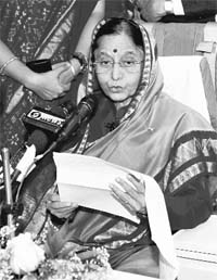On board special aircraft, President Pratibha Patil reads a statement about her seven-day state visit to United Kingdom and Cyprus