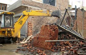 A demolition drive in progress in Bathinda