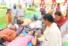 Students and staff members of Panjab University donate blood on Gurpurb on Monday.
