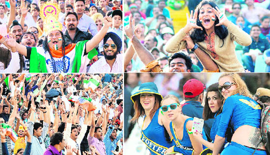 Fans in high spirits during the One-Day International cricket match between India and Australia at the PCA Stadium in Mohali on Monday.