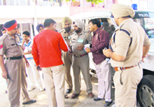 A black marketeer being rounded up at Mohali on Monday.