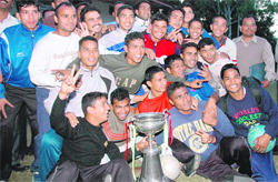 The Uttarakhand Police team pose with 9th Gautam Gurung Memorial Trophy in Dehradun