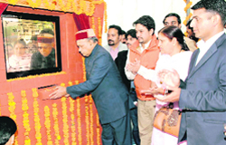 Chief Minister Prem Kumar Dhumal laying the foundation stone of a parking complex at Hamirpur