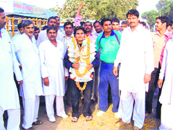 Residents welcome Reena Kadian at her native Chimni village in Jhajjar district.