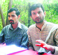 President of the Sangharsh Samiti Ranjeet Sharma addresses mediapersons in University of Jammu