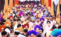Devotees pay obeisance at a gurdwara on Gurpurb in Jammu