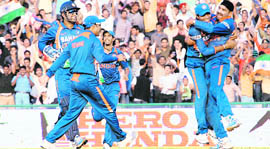 Indian players celebrate the wicket of Ricky Ponting during the 4th ODI at PCA Stadium in Mohali on Monday. 
