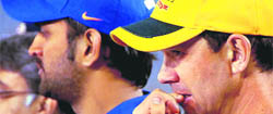 MS Dhoni (L) and Ricky Ponting at the presentation ceremony after the 4th ODI at the PCA stadium in Mohali on Monday. 