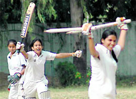 Players of Sacred Heart School in a jubilant mood after winning the Chandigarh State Junior (under-19) Women Cricket Tournament for Kedar Nath Trophy at the GMSSS, Sector 56, on Tuesday.