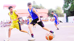 A u-15 basketball tournament for boys in progress at the Doon International School in Dehradun 