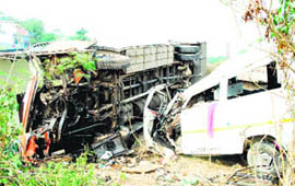 The mangled remains of the Tempo-Traveller and the bus that collided head-on at Baghial Morh in Kathua on Tuesday.