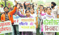 Members of various social organisations under the banner of the Jan Jagriti Manch hold a protest in Jammu on Tuesday.