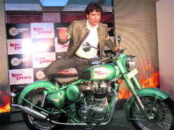 Sidharth Lal, managing director & CEO, Eicher Motors poses with the new Royal Enfield motorcycle at its launch in New Delhi on Wednesday. Royal Enfield launched two new variants, Classic 500 priced at Rs 1,24,498 and Classic 350 priced at Rs 98,086