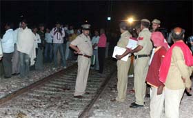 Police officials on Tuesday night inspect the site of rail mishap at Asawati railway station near Palwal which killed 6 persons