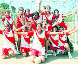 Girls show victory sign after winning the basketball matchin the ongoing Regional Sports Meet of the Kendriya Vidyalaya Sangathan in Dehradun on Wednesday