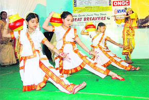 Participants perform a dance item during a competition organised by Swyambhu World, an interactive magazine, at the ONGC Community Centre in Dehradun on Thursday. More than 200 children from various schools participated in it.