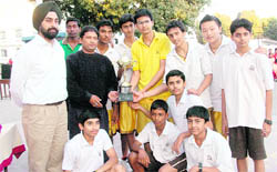 The Welham Boys School team with trophy in Dehradun on Thursday.