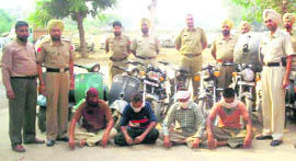 The gang of two-wheeler thieves along with stolen vehicles in the custody of the Sudhar police.