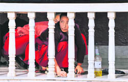 Buddhist nuns clean the Tawang Monastery in Arunachal Pradesh on Thursday during preparations for Dalai Lama's November 8 visit.