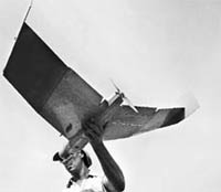 Israels Arad Group technician holds a drone as he demonstrates a fly-by system, which collects data from water meters, in a field near Tel Aviv.