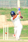 Romesh Powar of Mumbai plays a shot against Punjab at the Sector 16 stadium in Chandigarh