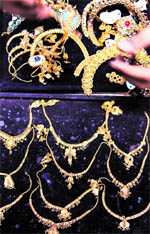 A foreign visitor looks at Sri Lankan leather goods at an exhibition in Colombo on Friday. Sri Lanka is seeking to boost its leather exports as part of efforts to help small and medium scale manufacturers
