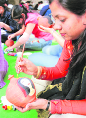 Students take part in the pot-painting contest during the PEC Fest-09. 