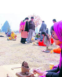 A painting competition in progress during the Kashmir University Youth Festival