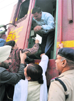 Protesters bring down the engine driver.