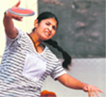 A girl (u-17) hurls a disc on the second day of the 56th Punjab School Games at Guru Nanak Stadium, Ludhiana,