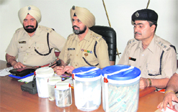 Khanna SSP Sukhminder Singh Mann and other police officers with the explosives seized in Machhiwara