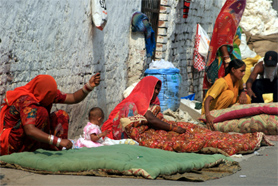 Women making quilts at Dhobi Ghat near Bathinda Fort.