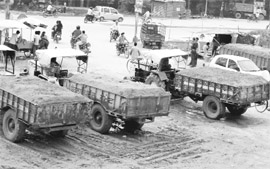 Tractor-trollies loaded with construction material block traffic at Baltana in Zirakpur.